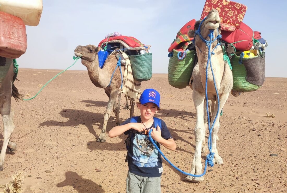 family-hikes-morocco Children during a family desert trek in Morocco